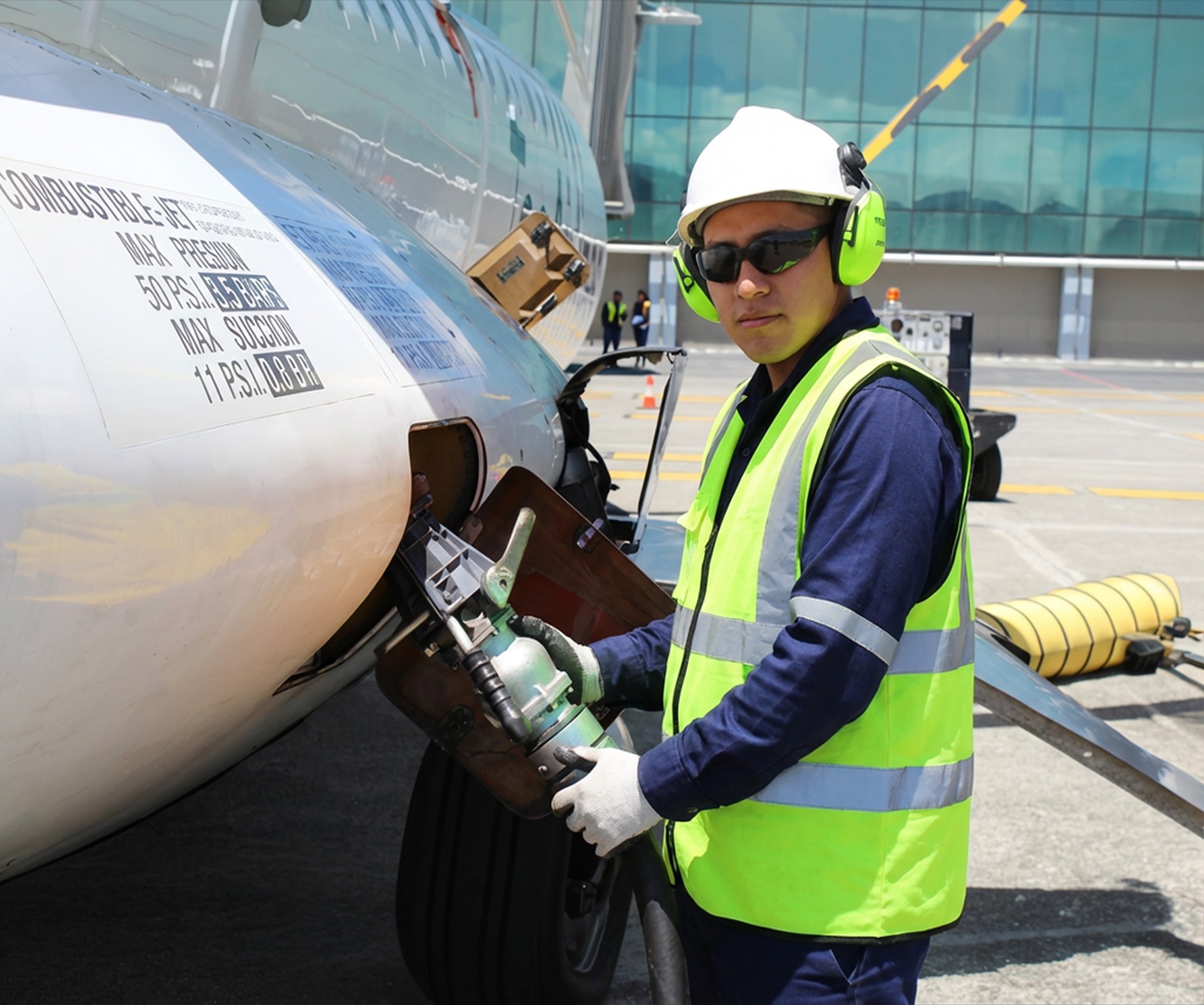 OAS Aviation AVSEC-certified safety operations — fueling with full PPE