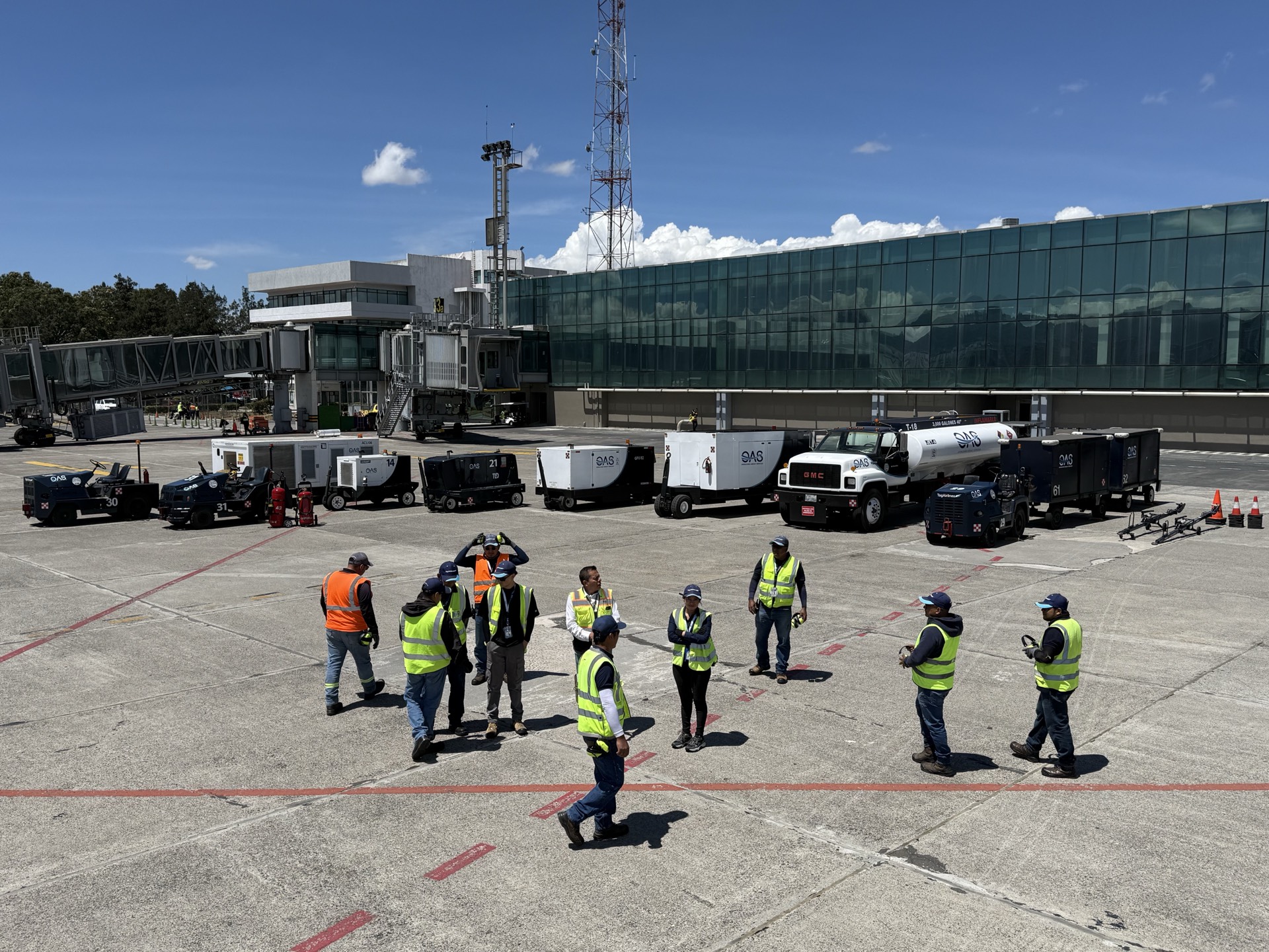 OAS Aviation team briefing before operations at La Aurora International Airport